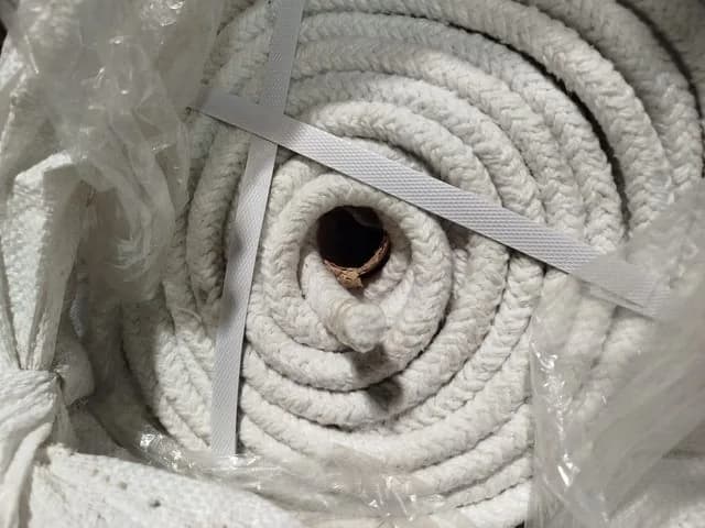 Coil of braided white ceramic fibre rope